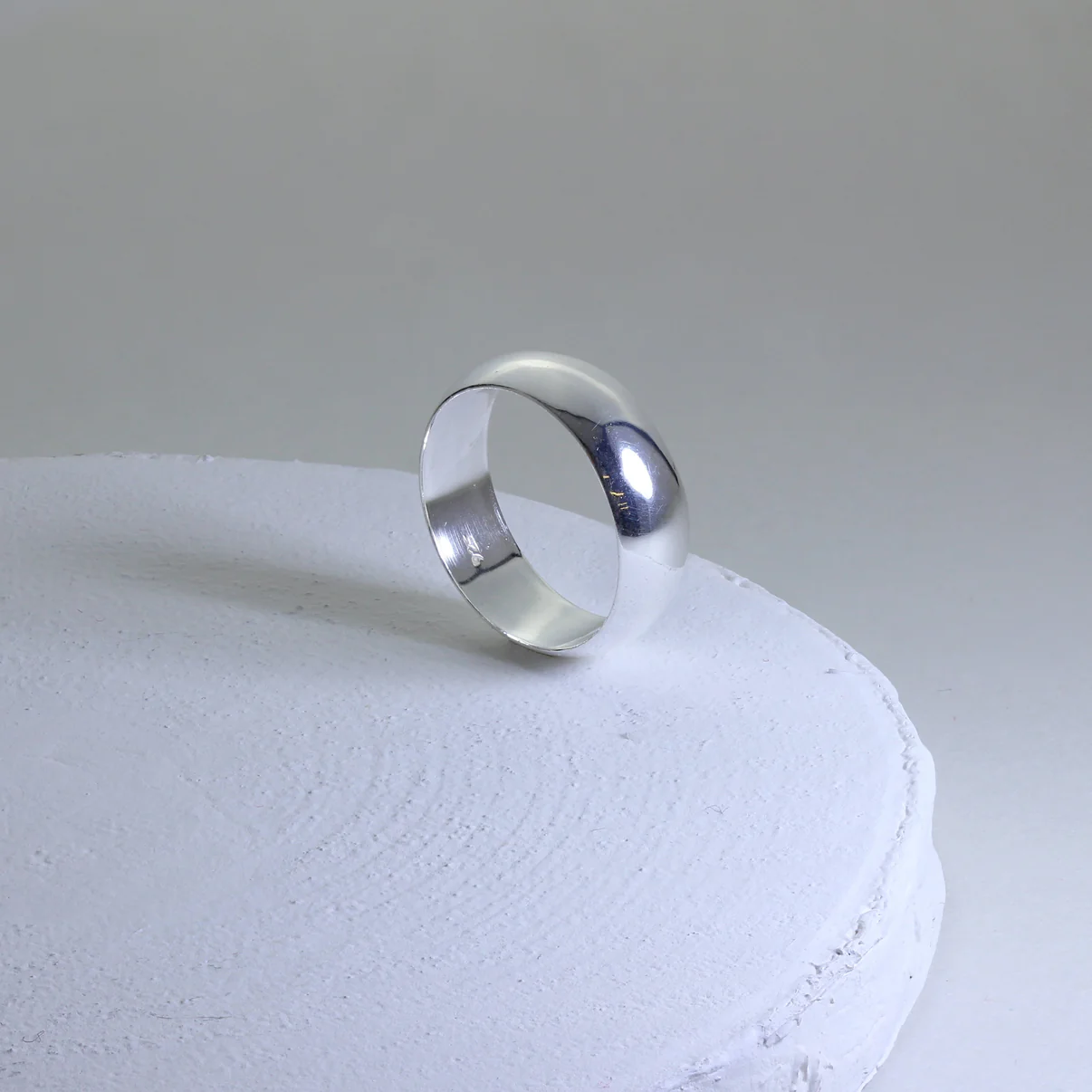 HAR-0906_Sterling_Silver_5mm_D_Shaped_Wedding_Band_Ring_Size_I_Z_5_View_1_d7c0de82-0e08-4a9d-9940-3de72f5c893a.webp